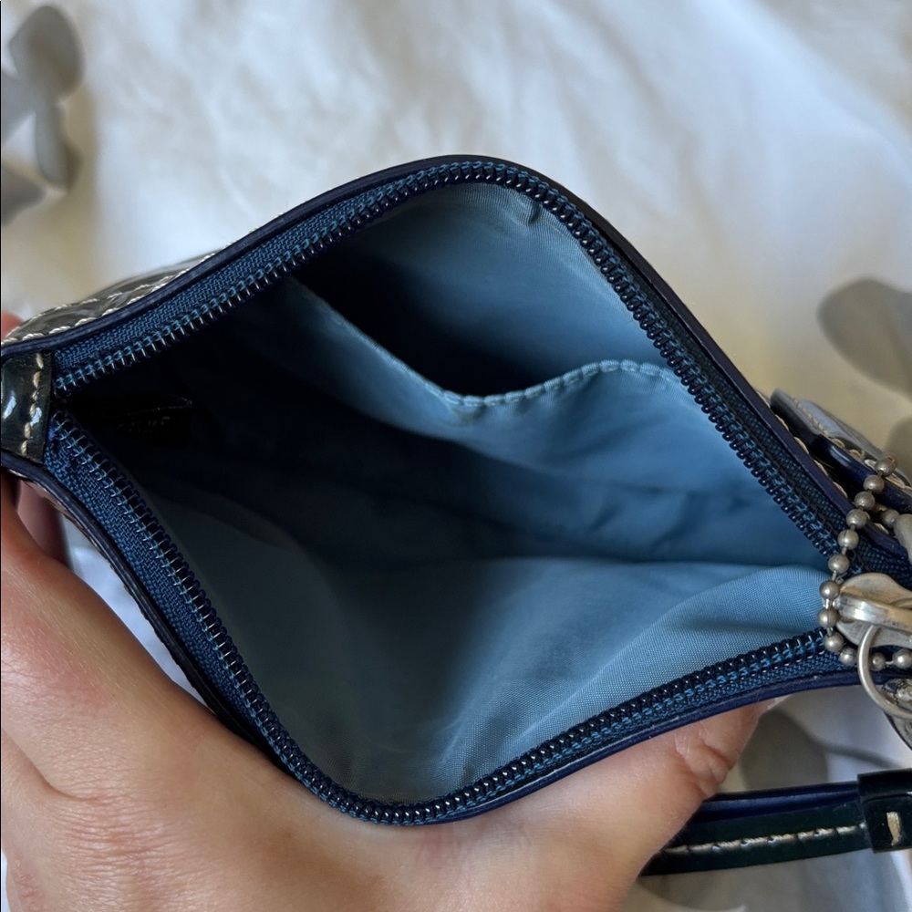 ⭐️ 3 for $20 - Bundle and save!!⭐️
COACH Navy Patent Leather Wristlet - Picture 4 of 8